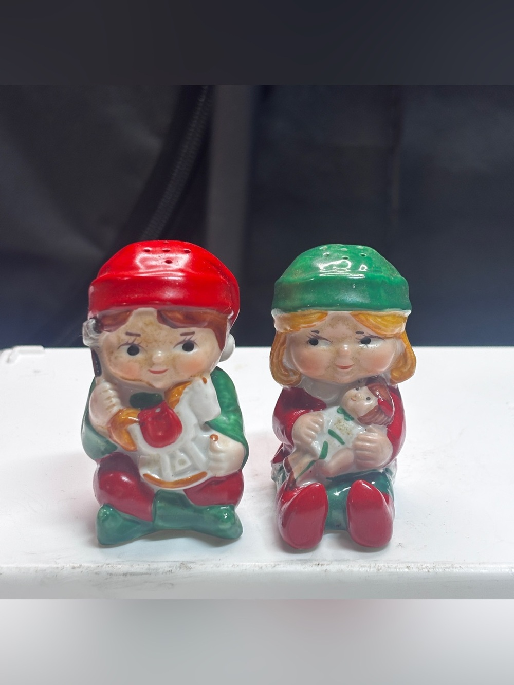 1983 Avon "Santa's Helpers" porcelain salt and pepper shakers